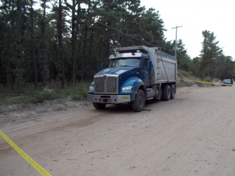 Accident scene where the truck moved forward and fatally injured the victim