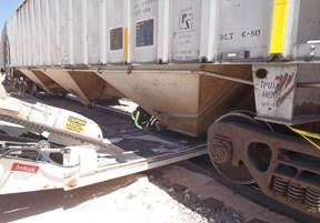 Wide angle of the rail car showing the positions the conveyor and the feed spout.