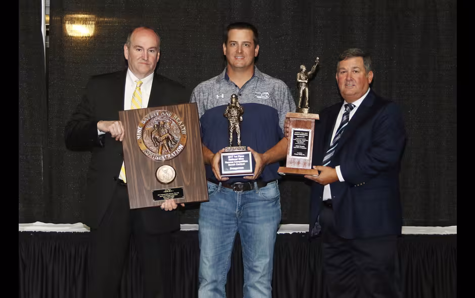 1st Place Bench BG-4 - CNXC Resources Harvey Blue team - John Helmick on stage