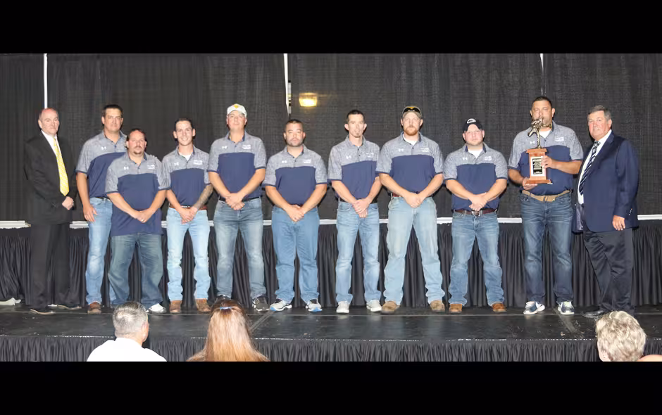 2nd Place Mine Rescue Overall - CNXC Resources Harvey Grey Team on stage