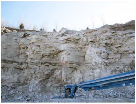 accident scene where The victim was working on a lift, taking samples from a highwall, when a large rock fell and struck him.