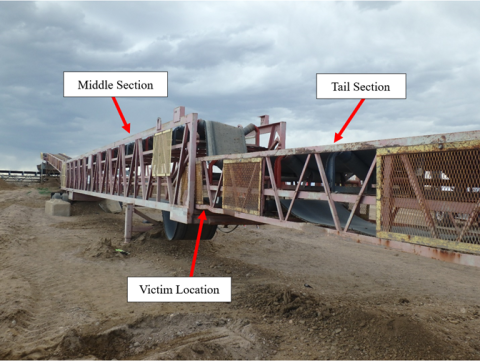 Accident scene where a miner died when the tail section of a collapsible belt conveyor fell and pinned him between the tail section and middle section.