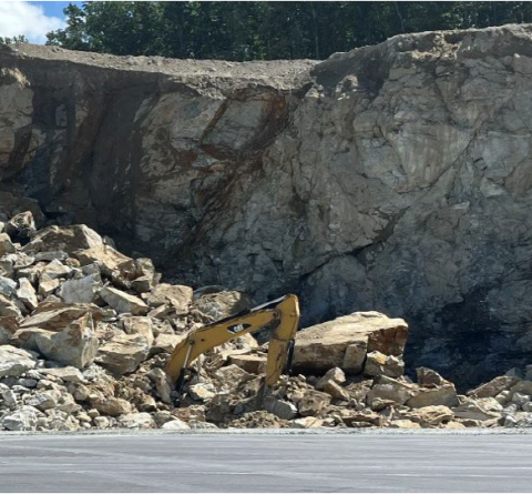 Highwall near collapsed on the excavator.