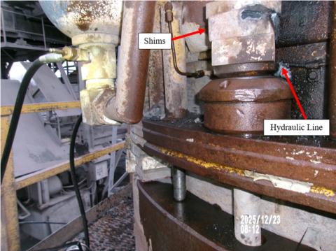 Accident scene where a contractor died after receiving burns from a pressurized hydraulic line that ruptured and caught fire.