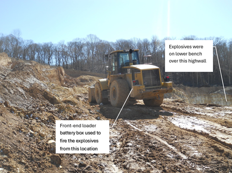 Accident scene where a miner was fatally injured at a surface mine when flyrock from blasting operations struck him.