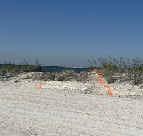 Accident scene where a miner died after the haul truck he was driving went over a berm along the haul road and into a water-filled pit.