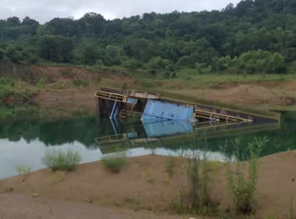 Accident scene where a 50-year old Superintendent  with 26 years of experience was killed at a sand and gravel dredge operation.