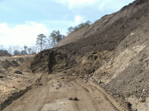 A collapsed section of an 80 foot high bank