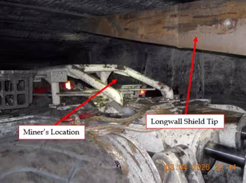 Accident scene where a miner died after a scoop backed into another scoop that was transporting a longwall shield.