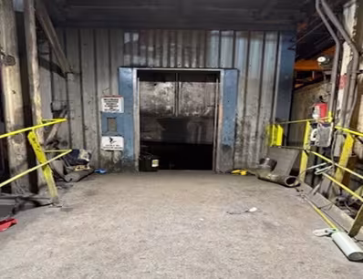 Accident scene where while performing elevator testing, a miner died when the elevator descended and struck him on the first-floor platform.