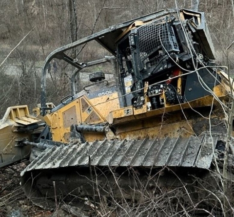 On February 26, 2023, a contract miner died while operating a bulldozer.  The bulldozer traveled over the edge of an access road and rolled feet down an embankment, ejecting the miner from the operator’s cab.  The miner was not wearing a seatbelt.