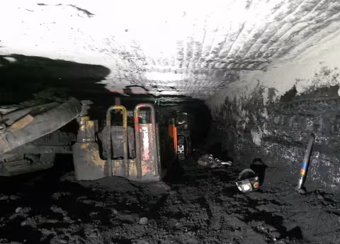 Accident scene where mobile bridge carrier pinned the operator against the coal rib, causing fatal injuries.