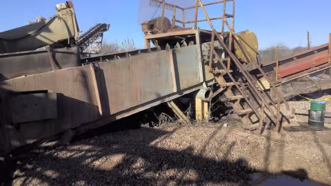 Accident scene where a miner died when he became entangled in a log washer.