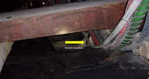 Accident scene where a miner died after a longwall shield hydraulically collapsed on him while performing maintenance on the shield.