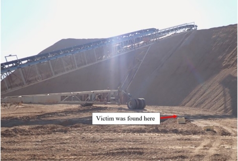 Accident scene where a miner died when he was struck by a mobile radial stacker conveyor.