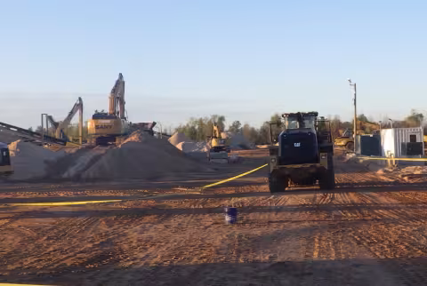 Accident scene where a miner died after a front-end loader struck him while he was crossing an equipment travelway. 