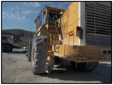 Accident scene where a 60 year old Mechanic, with 28 years of experience, was fatally injured at a Magnesite facility.