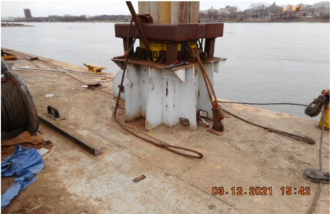 Accident scene where a miner was fatally injured while attempting to insert a steel pin into a spud beam.