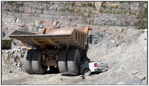 Accident scene where a lead person was killed when his pickup truck was struck by a haul truck