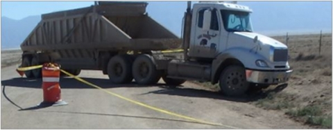 accident scene where a contract truck driver with 20 years of experience was fatally injured while operating a haul truck.