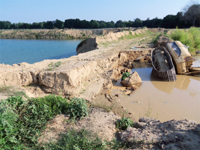 a dike separating two ponds