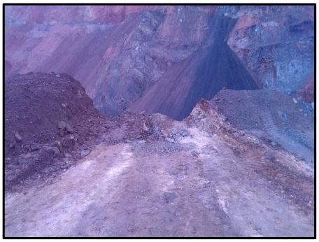 Accident scene where a 54-year old miner with 5 years of mining experience was killed at a surface sand and gravel operation.