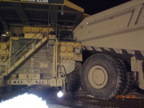 Two haul trucks after they collided.