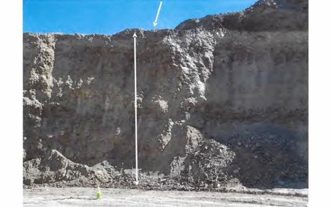 The top arrow indicates where the miner was standing without proper fall protection in relation to the 50-foot highwall drop.