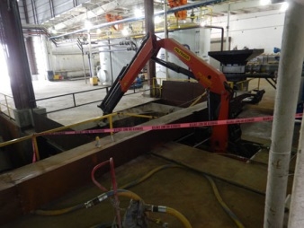 Accident scene where a flash fire occurred when a miner was welding near a pit containing flammable vapors.