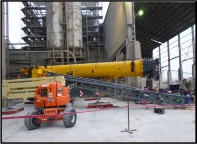 Accident scene where a crane operator suffered serious injuries while attempting to stow the crane’s lattice extension.