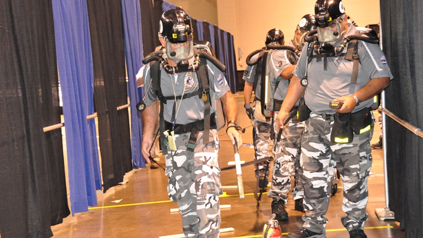 A mine rescue team working a problem during the mine rescue portion of the competition.