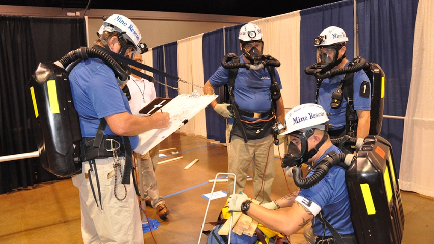 A team documenting and recording findings.